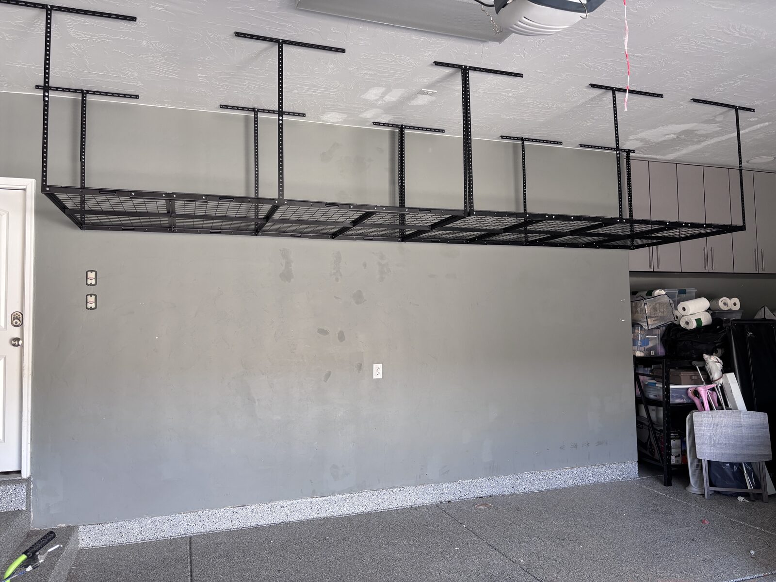 Overhead storage rack installed the length of a St. George garage ceiling