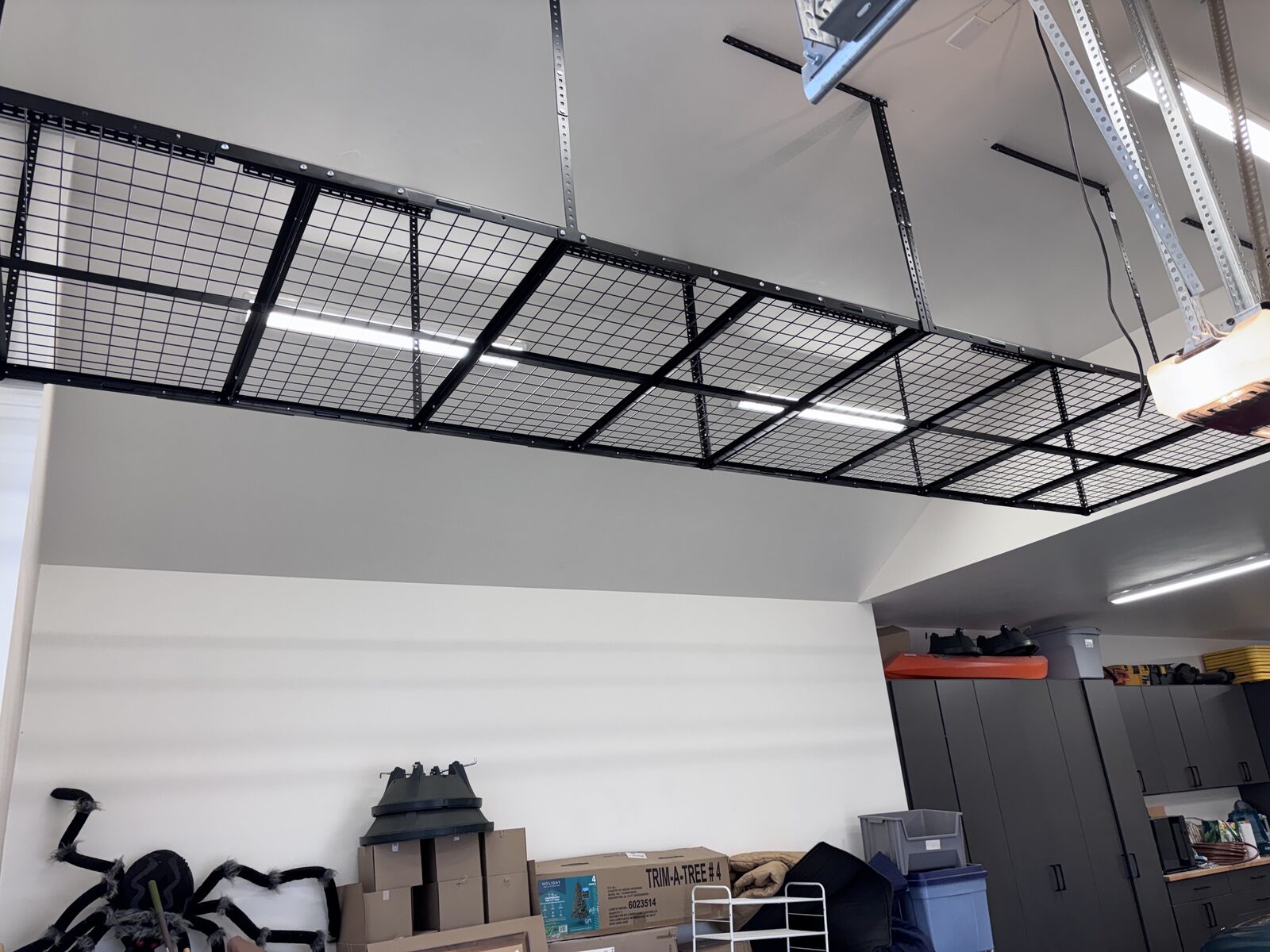 Overhead storage racks installed in a St. George three-car garage